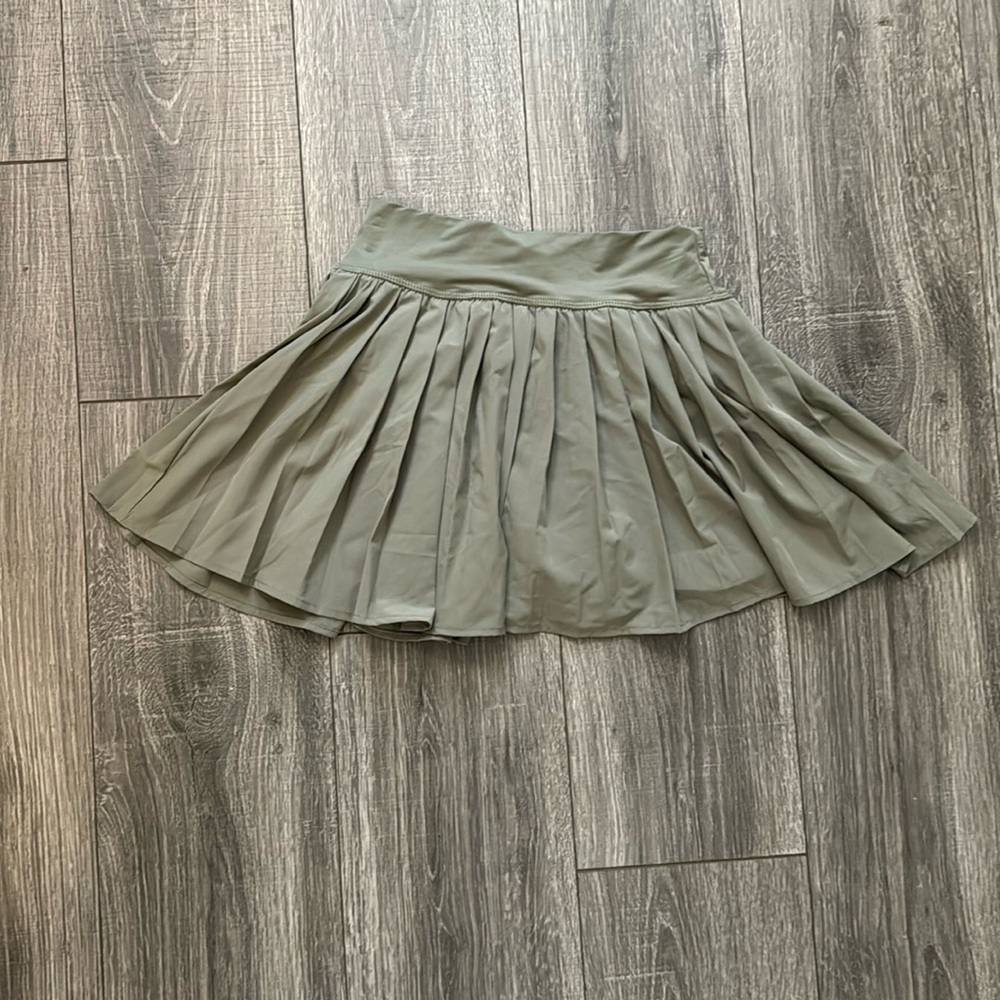 Green skort, never worn and in great condition.